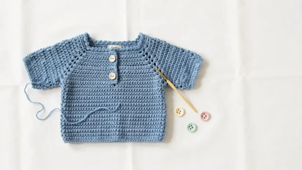 Vienna crochet summer top for kids in sky blue cotton DK yarn — easy free pattern