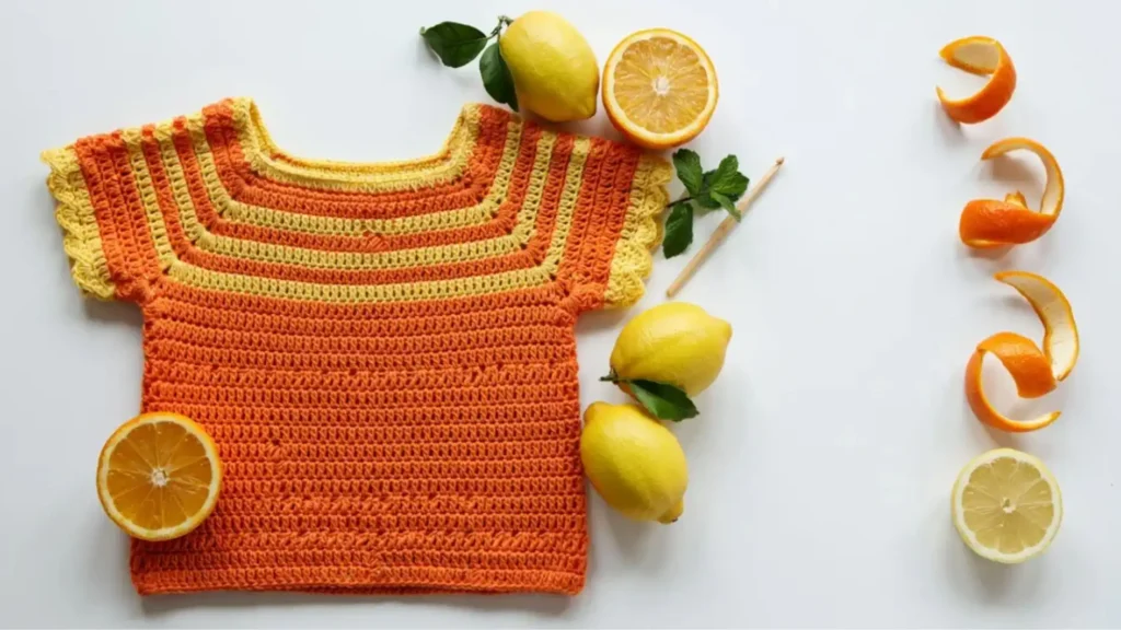 Citrus Sunshine crochet summer top for kids in bright orange and yellow cotton yarn — free pattern