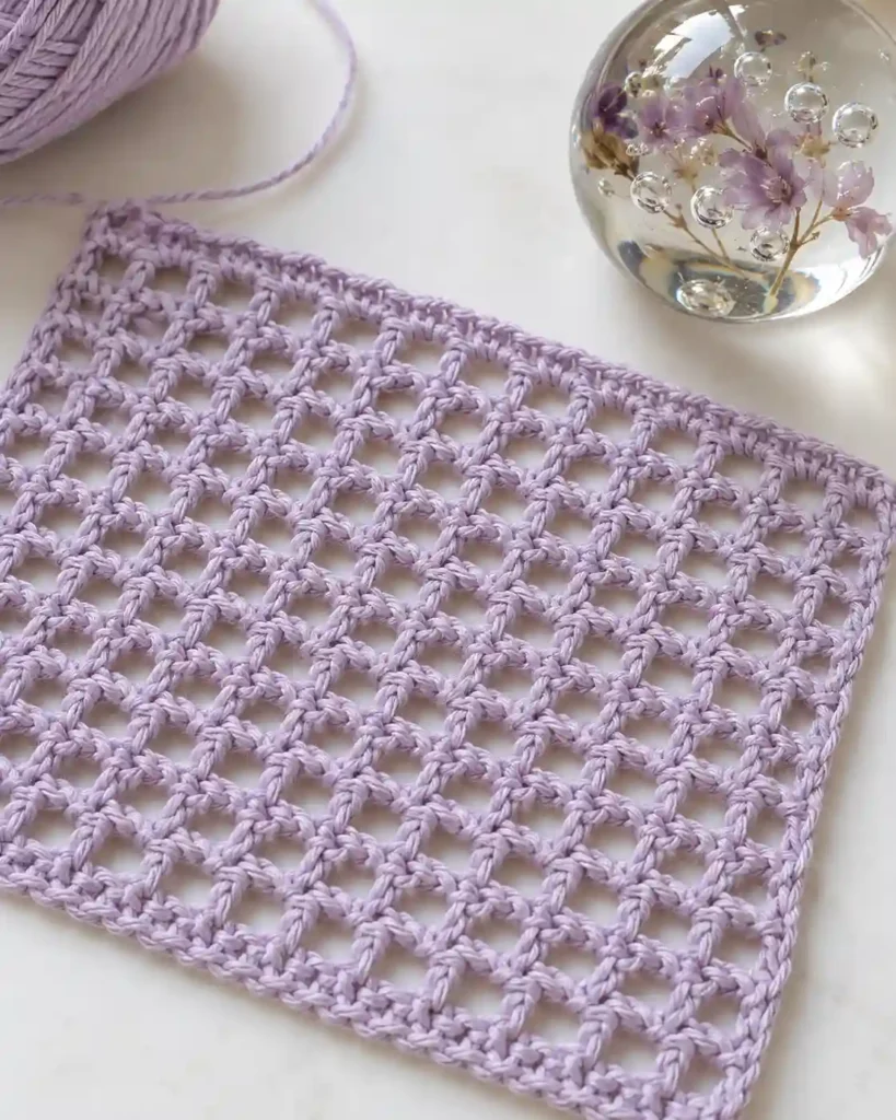 Pale lilac mini mesh crochet stitch with closely spaced tiny holes